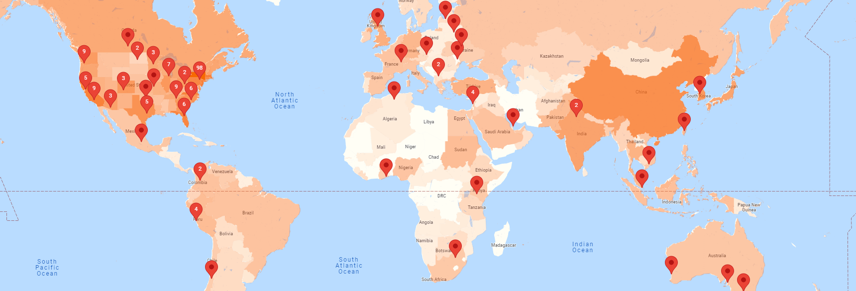 Map of the world with pins where alumni live