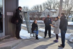 Walk Audit Team evaluating the lighting, signage, sight lines, and accessibility near the SALT Quarters. 