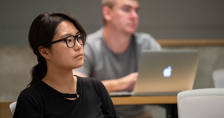 Woman sitting in classroom