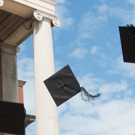 Throwing graduation caps in celebration