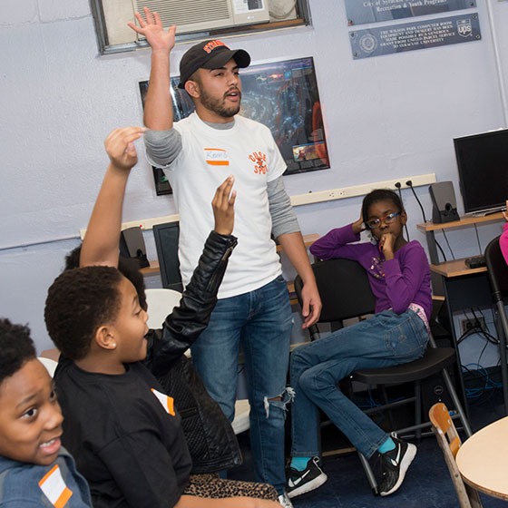 Community partner working with school kids