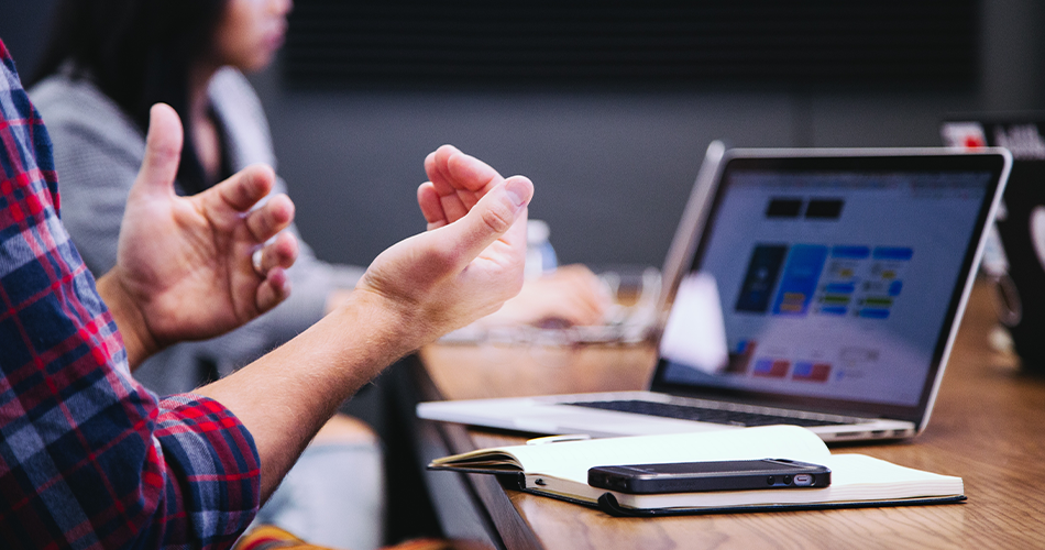 A person's hands explaining what they are talking about