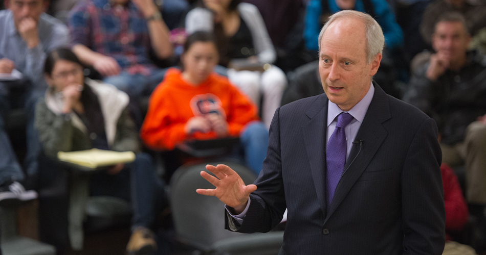 Michael Sandel presenting in Maxwell auditorium