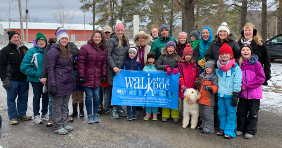 Group of people standing together outside