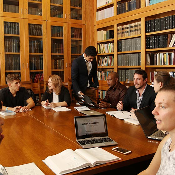 PAIA students gathered in conference room