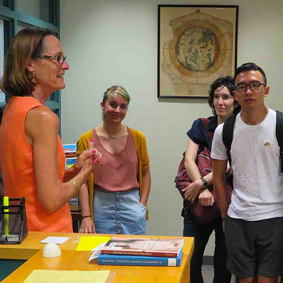 Geography staff and students in office