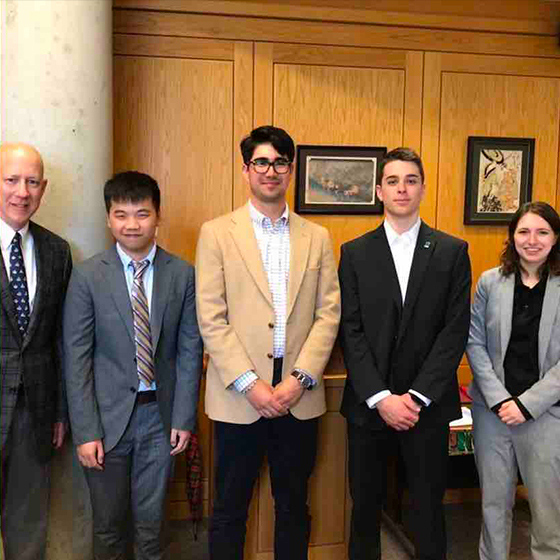 Professor Kutcher with students