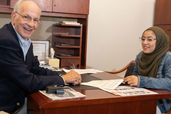 Professor Bill Coplin with a student