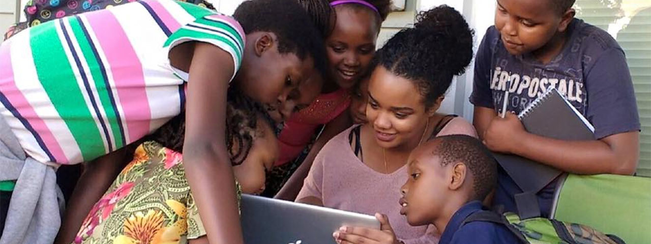 Children looking at a laptop