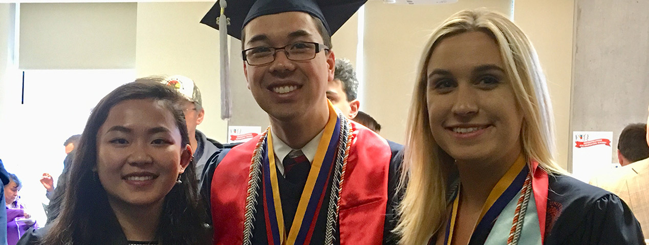 Students wearing regalia