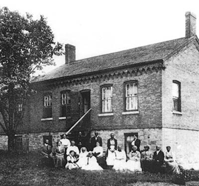 Harriet Tubman and supporters outside of John Brown Hall