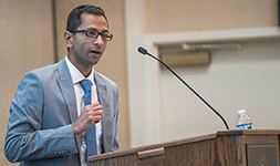 Sanjay Basu giving a lecture on public health