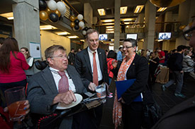 Kent Syverud talking to a disabilities advocate, Brian McLane