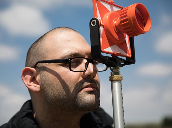 Person surveying a site