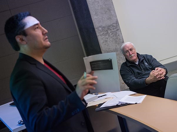 Student presenting in a classroom