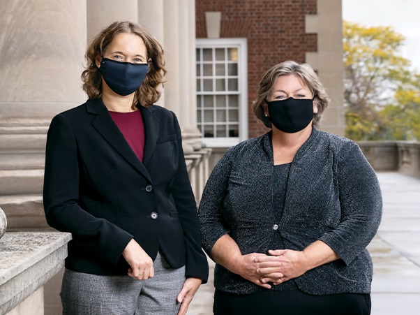 Two women standing in front of Maxwell