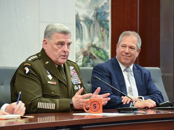 Two men sitting at table